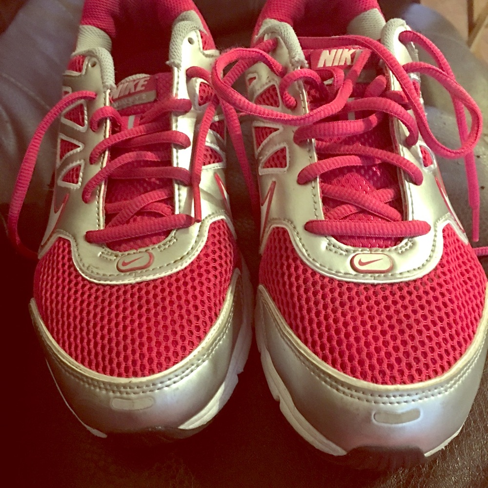 Pink and silver running shoe